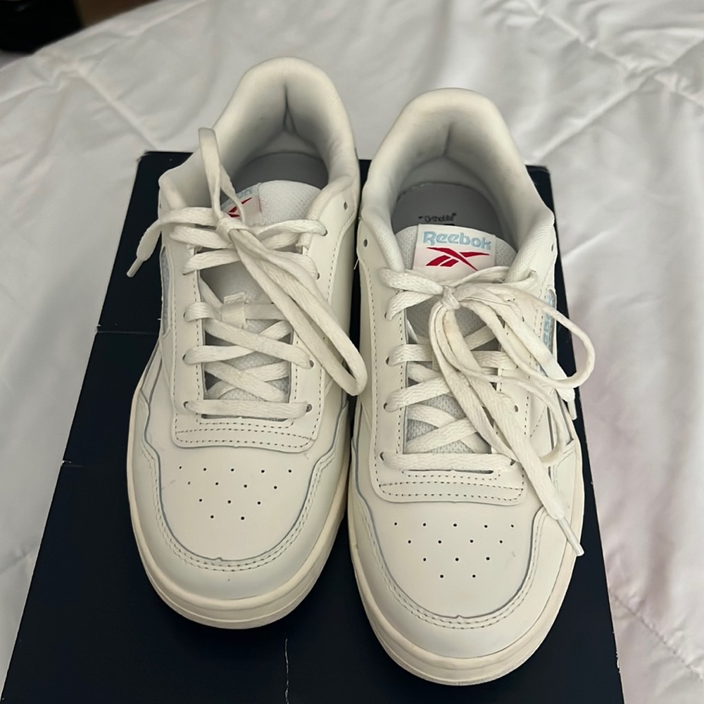 Reebok tennis sneaker. White like new, worn once. 7 months 1/2